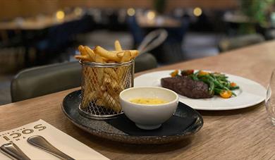 Steak with fries at "The social bar & bistro!" in Langesund