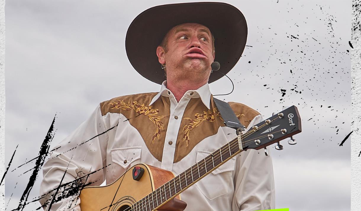 plakat med mann med cowboyhatt