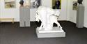 Sculpture, milking a goat