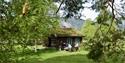 Sommarstemning i Øyskogen. Fyresdal bygdemuseum.
