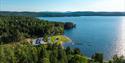 dronebilde av badeplassen på Follsjøen i Notodden