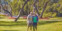Couple walking in Brekkeparken in Skien