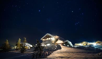 The cabins from Vrådal booking on a winter night