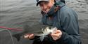 Fiskejegeren Ole Martin, en erfaren guide som også arrangerer fisketurer og hjelper deg gjerne om du trenger råd og tips!